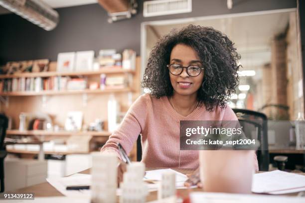 reasons why you should budget your money - african american money stock pictures, royalty-free photos & images