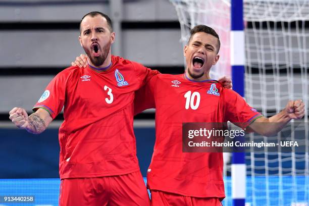 Bolinha and Vassoura of Azerbaijan celebrate scoring during the UEFA Futsal EURO 2018 group D match between France v Azerbaijan at Stozice Arena on...