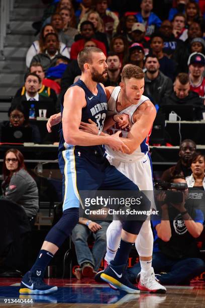 Blake Griffin of the Detroit Pistons guards Marc Gasol of the Memphis Grizzlies on February 1, 2018 at Little Caesars Arena in Detroit, Michigan....