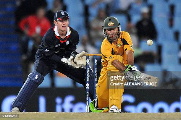 Australian batsman Ricky Ponting shapes up for a reverse-sweep off the ball of England's bowler Paul Collingwood as wicket-keeper Steve Davies during...
