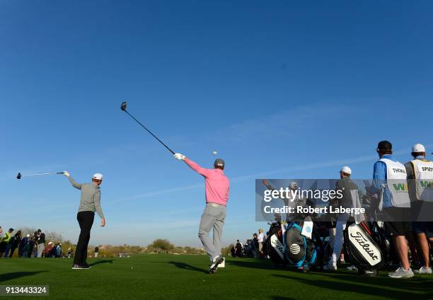 Jordan Spieth and Patton Kizzire react to a tee shot on the 13th hole during the second round of the Waste Management Phoenix Open at TPC Scottsdale...