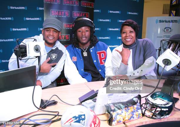 SiriusXM radio hosts Sway Calloway and Heather B and Alvin Kamara of the New Orleans Saints attend SiriusXM at Super Bowl LII Radio Row at the Mall...