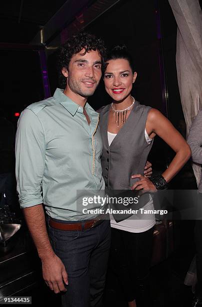 Khotan Fernandez and Candela Ferro attend Rocco Donna's 5th Anniversary celebration at LIV nightclub at Fontainebleau Miami on October 1, 2009 in...