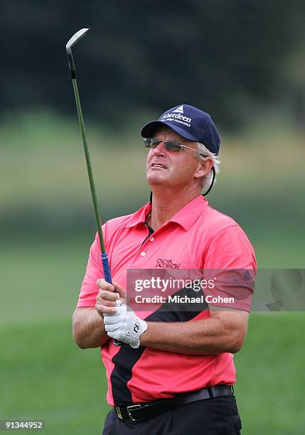 Sandy Lyle of Scotland watches his iron shot during the second round of the Constellation Energy Senior Players Championship at Baltimore Country...