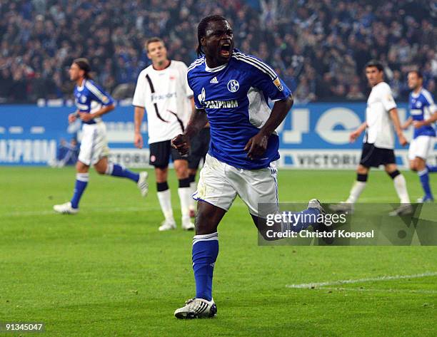 Gerald Asamoah of Schalke celebrates the first goal during the Bundesliga match between FC Schalke 04 and Eintracht Frankfurt at Veltins Arena on...