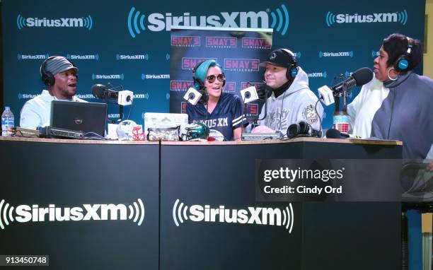 SiriusXM radio host Sway Calloway, Jenny McCarthy, Donnie Wahlberg and SiriusXM radio host Heather B attend SiriusXM at Super Bowl LII Radio Row at...