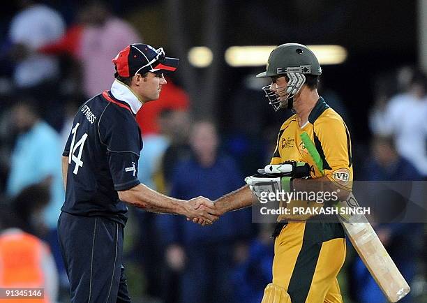 Australia's capatain Ricky Ponting shakes hands with England's captain Andrew Strauss after the victory during the ICC Champions Trophy's first semi...