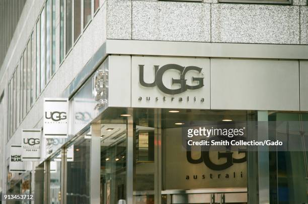 Close-up of sign on the facade of the UGG Australia upscale footwear retailer on the Upper East Side of Manhattan, New York City, New York, September...