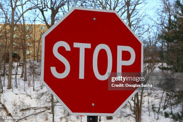 close-up of a roadway stop sign - stopping the loop stock pictures, royalty-free photos & images