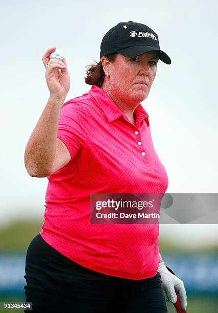 Meg Mallon waves after completing her second round play in the Navistar LPGA Classic at the Robert Trent Jones Golf Trail at Capitol Hill on October...