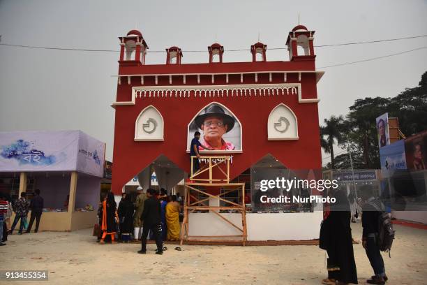 Bangladeshi shoppers brows books at a stall during the country's largest book fair in Dhaka on February 02, 2018. Bangladesh's largest book fair...