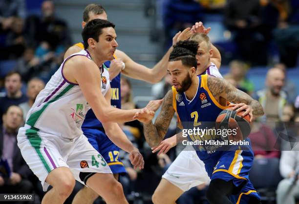 Tyler Honeycutt, #2 of Khimki Moscow Region competes with Carlos Suarez, #43 of Unicaja Malaga in action during the 2017/2018 Turkish Airlines...