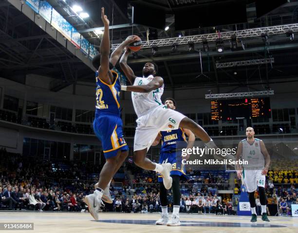 Charles Jenkins, #22 of Khimki Moscow Region blocks Mo Soluade, #6 of Unicaja Malaga during the 2017/2018 Turkish Airlines EuroLeague Regular Season...