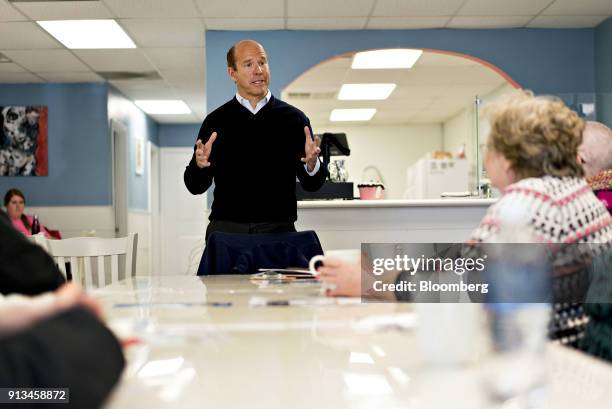 Representative John Delaney, a Democrat from Maryland and 2020 presidential candidate, speaks during a campaign stop at D'Alicias Cupcakery and Cafe...