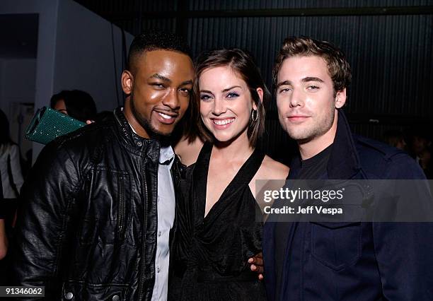 Actors Collins Pennie, Jessica Stroup, and Dustin Milligan pose during the 7th Annual Teen Vogue Young Hollywood Party held at Milk Studios on...