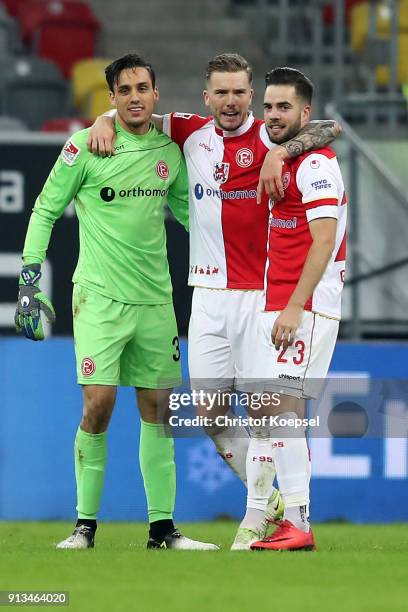 Raphael Wolf, Andre Hoffmann and Niko Giesselmann of Duesseldorf celebrate after the Second Bundesliga match between Fortuna Duesseldorf and SV...