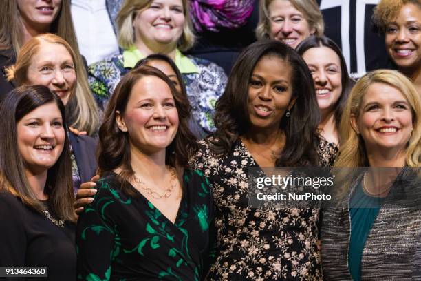 Kristen Perry of Chicago, Ill., former First Lady Of the U.S. Michelle Obama, and other school counselors, pose for a photo after the 2018 School...
