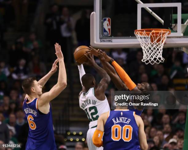 Terry Rozier of the Boston Celtics drives to the basket during the game against the New York Knicks at TD Garden on January 31, 2018 in Boston,...