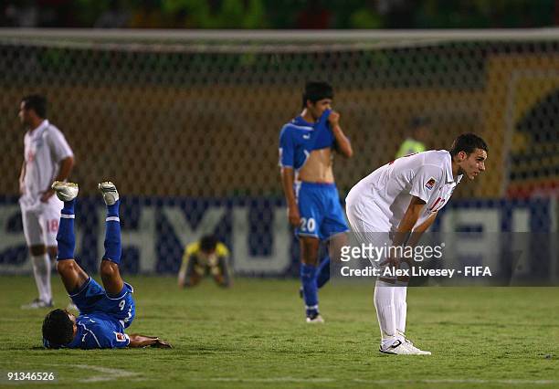 Matthew James of England looks dejected along with the Uzbekistan players at the close of the FIFA U20 World Cup Group D match between Uzbekistan and...