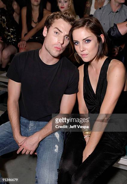 Actor Dustin Milligan and actress Jessica Stroup pose during the 7th Annual Teen Vogue Young Hollywood Party held at Milk Studios on September 25,...