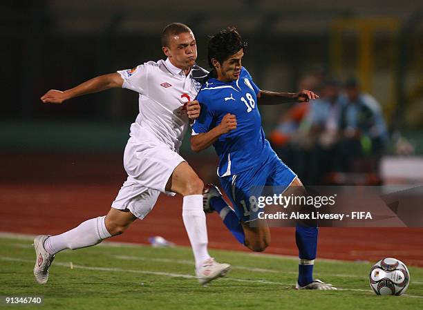 Kieran Trippier of England tackles Oybek Kilichev of Uzbekistan during the FIFA U20 World Cup Group D match between Uzbekistan and England at the...