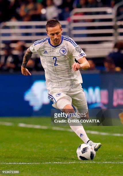 Bosnia & Herzegovina's Almir Bekic advances the ball against Mexico during a friendly football game at the Alamodome in San Antonio, Texas on January...
