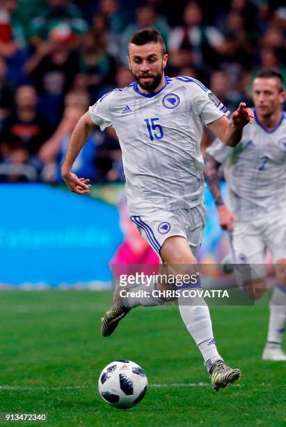 Bosnia & Herzegovina's Elvis Saric advances the ball against Mexico during a friendly football game at the Alamodome in San Antonio, Texas on January...