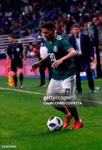 Mexico's Javier Aquino advances the ball against Bosnia & Herzegovina and Mexico during a friendly football game at the Alamodome in San Antonio,...