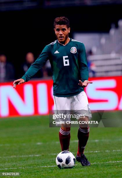 Mexico's Jonathan dos Santos advances the ball against Bosnia & Herzegovina during a friendly football game at the Alamodome in San Antonio, Texas on...