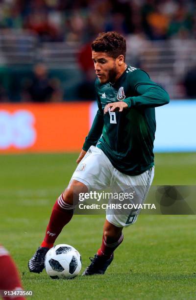 Mexico's Jonathan dos Santos advances the ball against Bosnia & Herzegovina during a friendly football game at the Alamodome in San Antonio, Texas on...