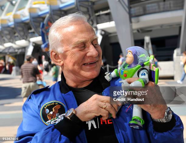 In this handout photo provided by Disney, Apollo 11 astronaut Buzz Aldrin poses Oct. 2, 2009 at the Magic Kingdom in Lake Buena Vista, Fla. With the...