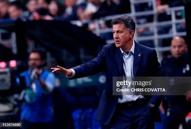 Mexico's head coach Juan Carlos Osoriora watches as his team plays Bosnia & Herzegovina during a friendly football game at the Alamodome in San...