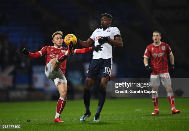 Josh Brownhill of Bristol City battles for the ball with Sammy Ameobi of Bolton Wanderers during the Sky Bet Championship match between Bolton...