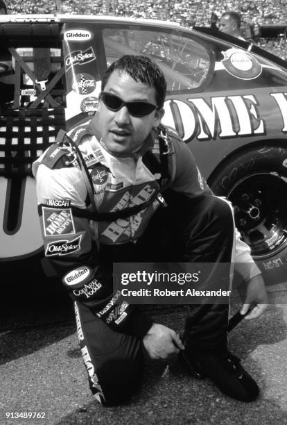 Racecar driver Tony Stewart prepares to enter his car prior to the start of the 2003 Daytona 500 stock car race at Daytona International Speedway in...