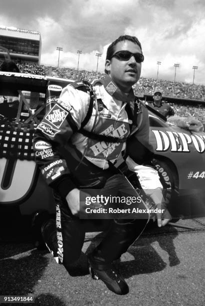 Racecar driver Tony Stewart prepares to enter his car prior to the start of the 2003 Daytona 500 stock car race at Daytona International Speedway in...