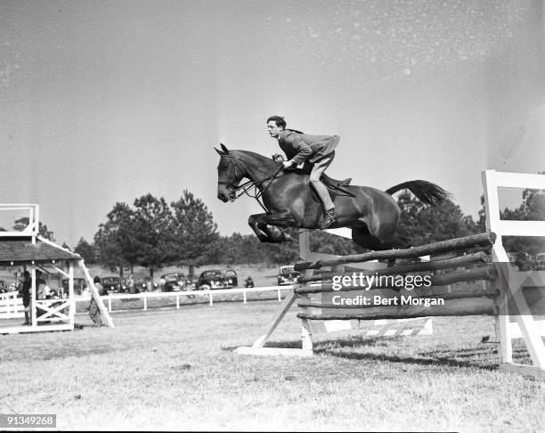 William F Buckley Jr show jumping his horse Pickles in Camden, South Carolina, March 25, 1941