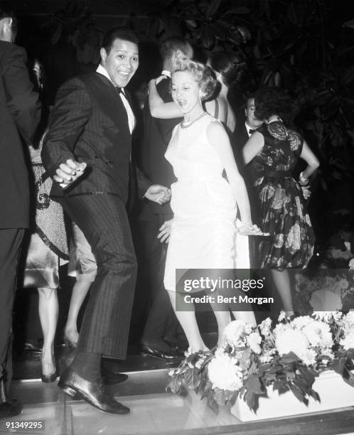 Cubby Checker and Kathryn Murray doing the twist at the Twist Party at the Four Seasons in New York City, to benefit Girls Town in Mt Plymouth,...