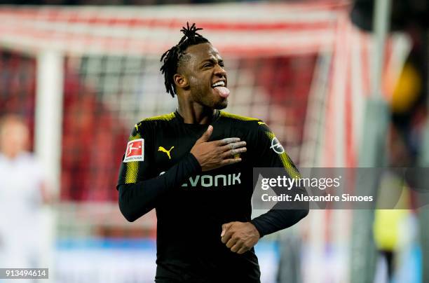 Michy Batshuayi of Borussia Dortmund celebrates scoring the goal to the 1:2 during the Bundesliga match between 1. FC Koeln and Borussia Dortmund at...