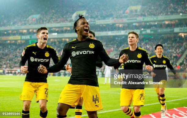 Michy Batshuayi of Borussia Dortmund celebrates scoring the goal to the 1:2 during the Bundesliga match between 1. FC Koeln and Borussia Dortmund at...