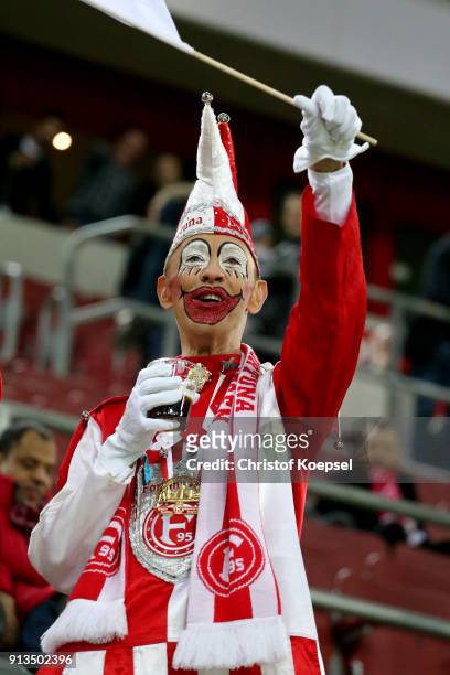 Fan fan of Duesseldorf in a carnival costume are seen prior to the Second Bundesliga match between Fortuna Duesseldorf and SV Sandhausen at...