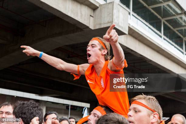 dutch fans going to match in the world cup 2014 - dutch world cup fans stock pictures, royalty-free photos & images
