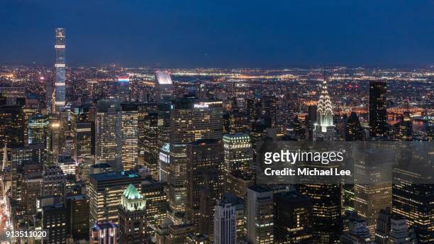 aerial view of new york at twilight - クイーンズボロ橋 ストックフォトと画像