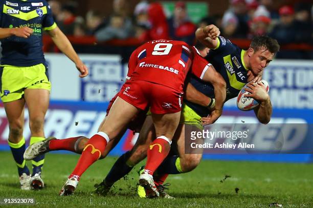 Hull KR's Shaun Lunt tackles Wakefield Trinity's Tyler Randell during the BetFred Super League match between Hull KR and Wakefield Trinity at KCOM...