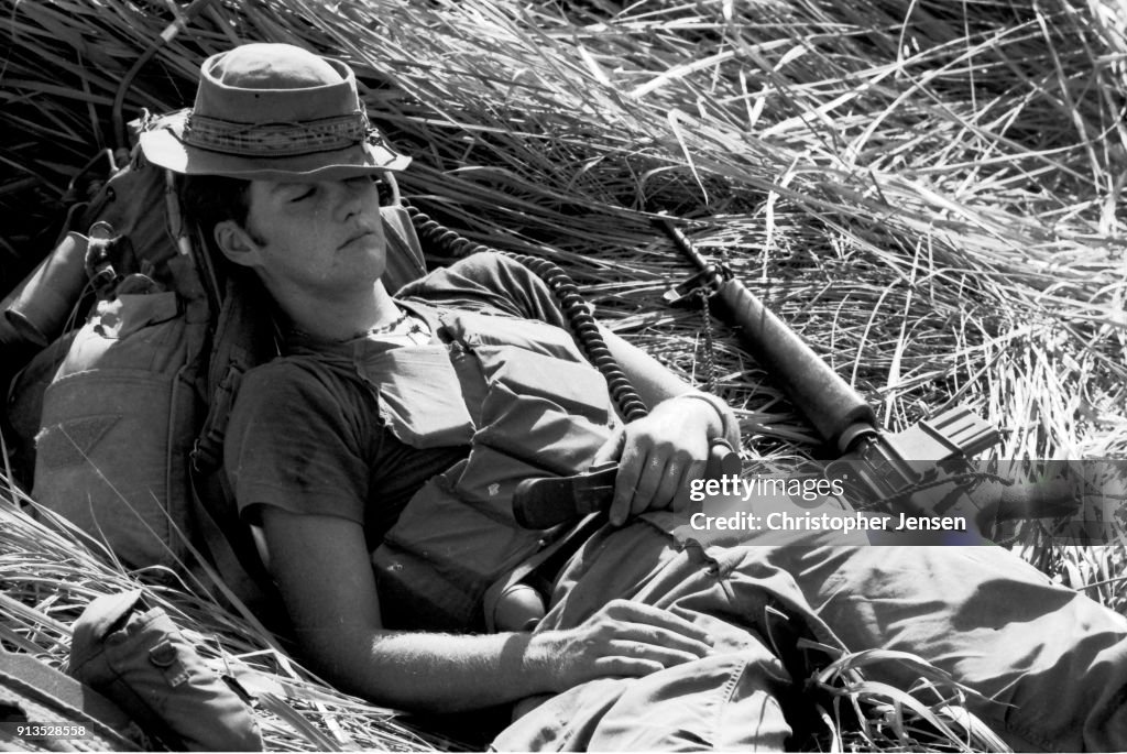 Military Police Rto View of a young US Army radiotelephone operator as he naps during a ...