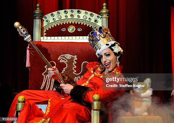 Burlesque dancer Trixee Sparkle performs on stage at Wintergarten Theater on October 2, 2009 in Berlin, Germany.