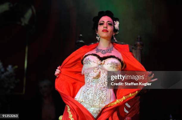 Burlesque dancer Trixee Sparkle performs on stage at Wintergarten Theater on October 2, 2009 in Berlin, Germany.