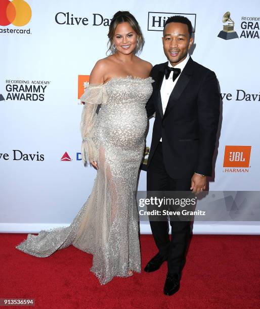 Chrissy Teigen;John Legend arrives at the Clive Davis and Recording Academy Pre-GRAMMY Gala on January 27, 2018 in New York City.