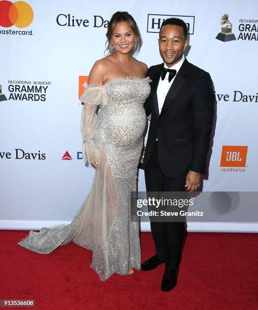 Chrissy Teigen;John Legend arrives at the Clive Davis and Recording Academy Pre-GRAMMY Gala on January 27, 2018 in New York City.