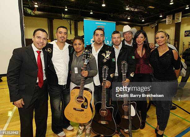 Jesus Enriquez, Los Compas de Terre with Gibson guitar winner, Marisol Terrazas and Vicky Terrazas at the Latin GRAMMY in the Schools at Benito...
