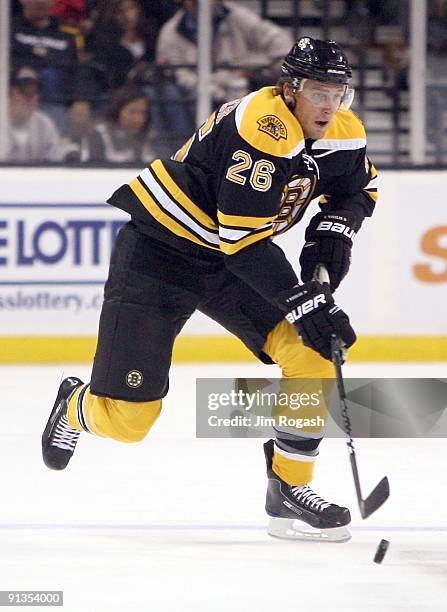Blake Wheeler of the Boston Bruins skates with the puck against the Columbus Blue Jackets at the TD Banknorth Garden on September 26, 2009 in Boston,...